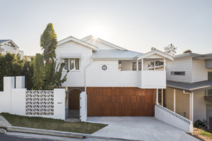 Revamped Queenslander with city views gets whole new interior
